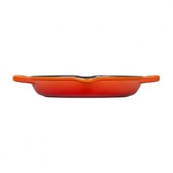 Hot Sale ???? Le Creuset 9.75" Deep Round Signature Grill Pan | Flame Orange ???? -Le Creuset Shop flame orange deep grill pan side view